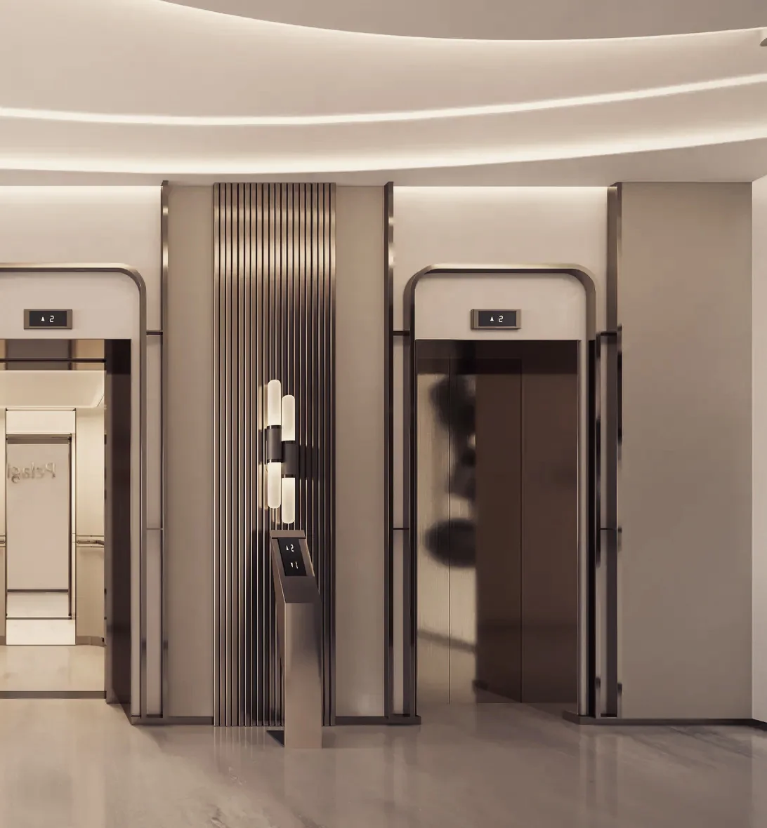 A lift lobby in bronze